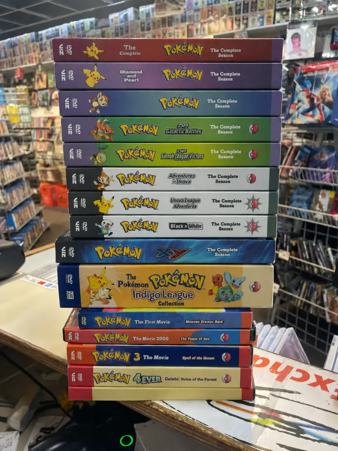 Wide selection of used CDs, DVDs, and games on display at CD Exchange